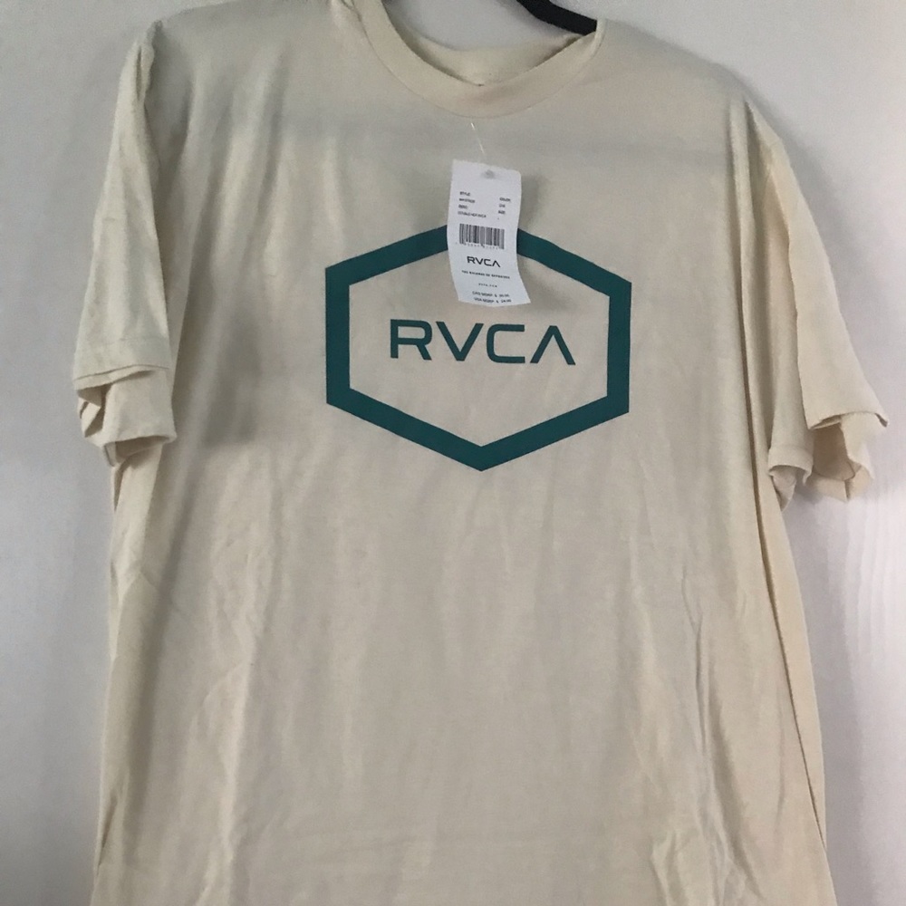 This is a brand new RVCA tee shirt It is a size large.